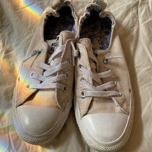 Light pink slip on Converse low tops